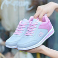 women's fashion sneakers feature a grey and pink design with a lace-up