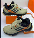 Beige and orange Adidas Terrex sneaker