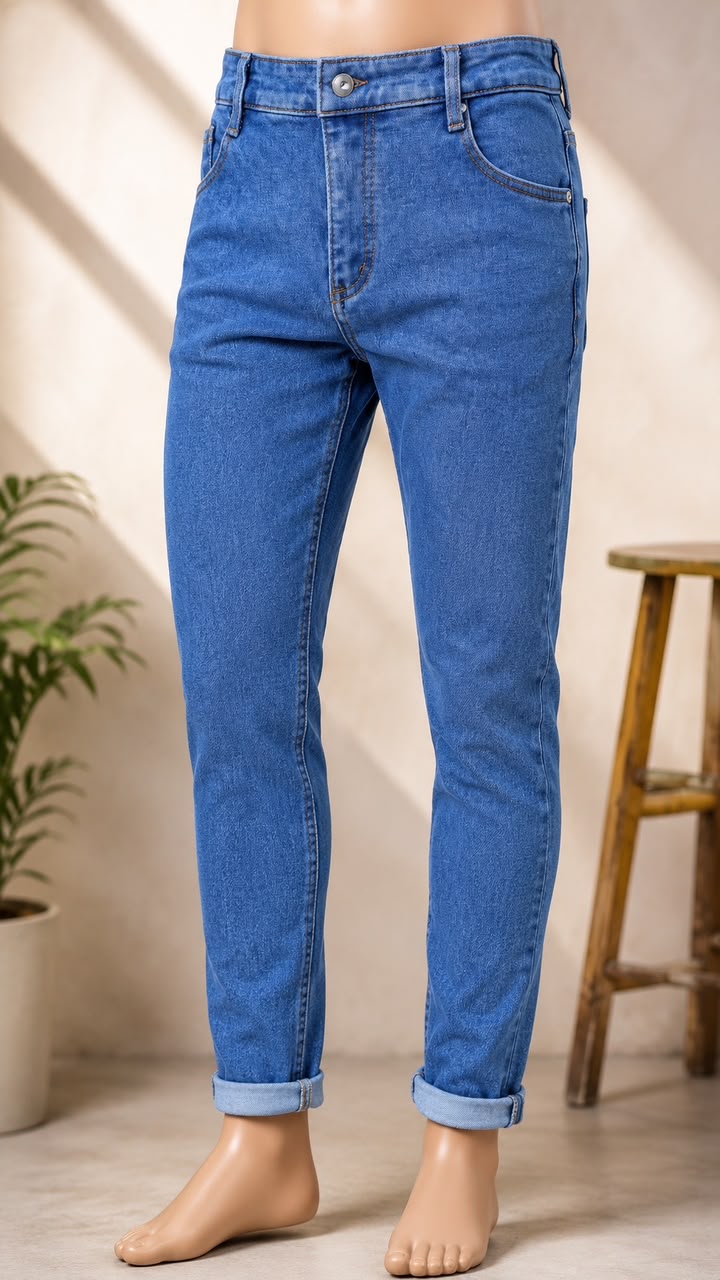Jean feature a tapered fit and folded cuffs at the ankles