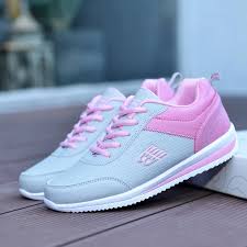 women's fashion sneakers feature a grey and pink design with a lace-up