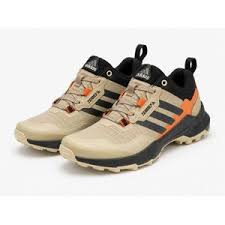 Beige and orange Adidas Terrex sneaker