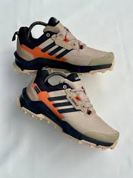 Beige and orange Adidas Terrex sneaker
