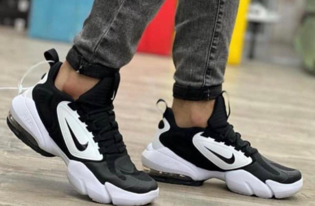 Black and white Nike Air Max Alpha Savage training shoe