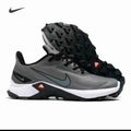 Gray and black Nike running sneakers