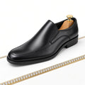 Classic black leather slip-on dress shoe