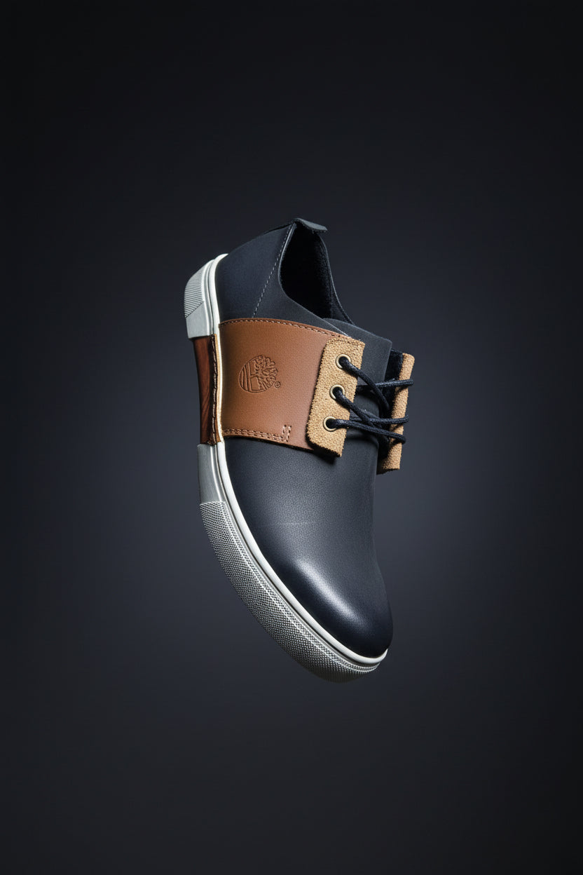 Dark brown and tan casual low-top lace-up leather shoe