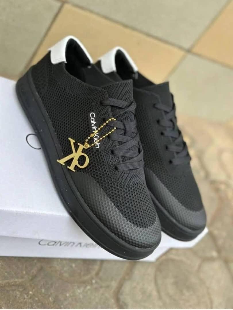 Black mesh Calvin Klein low-top sneakers