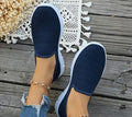 Navy blue slip-on knit walking shoe