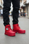 Bold red high-top boot