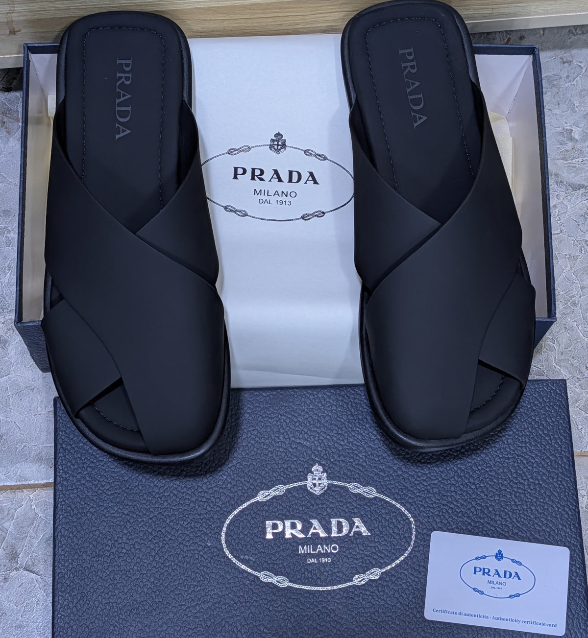 Black Prada crisscross slide sandals