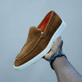 Brown suede slip-on loafers