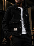Corduroy utility jacket with front button pockets and a collar.
