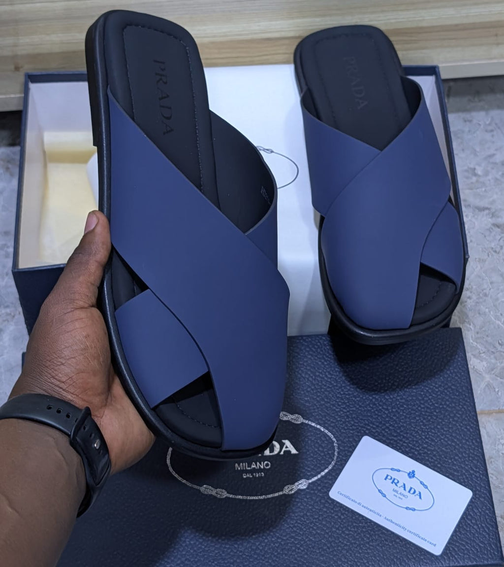 Navy blue Prada crisscross slides