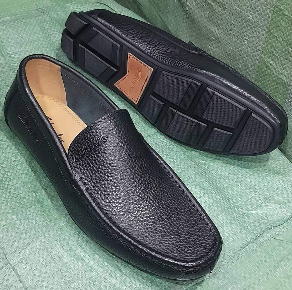 Black pebbled leather slip-on moccasin loafer