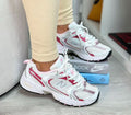 New Balance 530 in white and pink