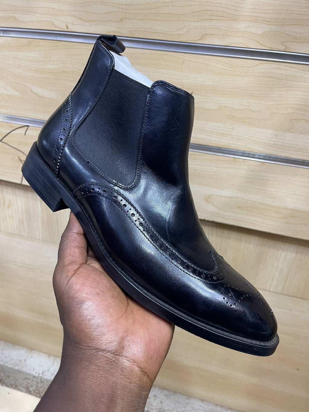 Black leather wingtip brogue Chelsea boot