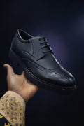 Black textured leather brogue lace-up shoes