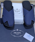 Navy blue Prada crisscross slides