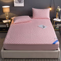 Pink quilted waterproof fitted mattress protector