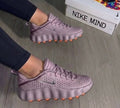 Nike Mind 002 sneakers in the "Light Violet Ore"