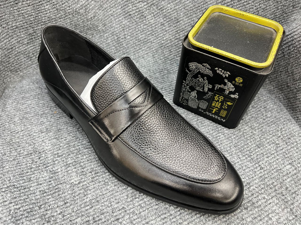 Brown textured leather penny loafers