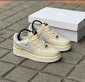 Nike Air Force 1 Low x Undefeated custom beige sneakers
