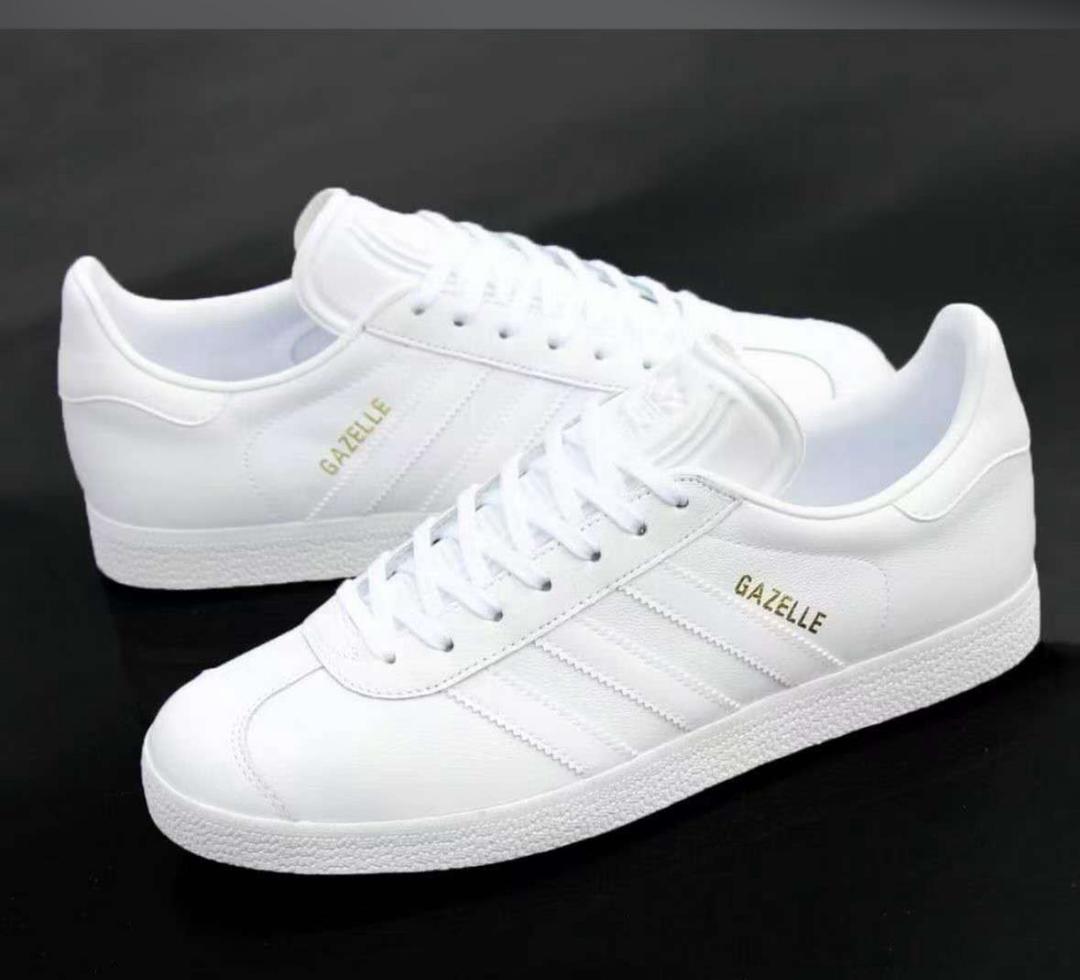 Adidas Gazelle sneakers in a clean, all-white leather
