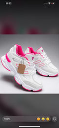 White and vibrant pink New Balance 9060 lifestyle sneaker
