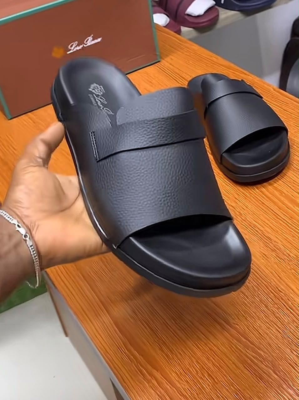 Black leather open-toe slide sandals