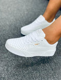 White leather puma sneakers