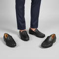Black pebble-grained leather penny loafers