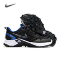 Black and blue Nike Fast X athletic sneakers