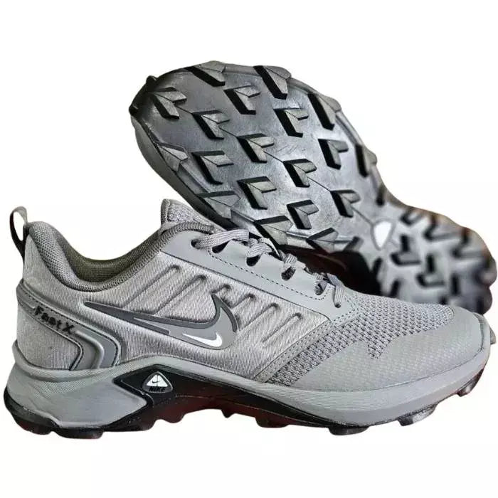 Grey Nike Fast X runner sneakers