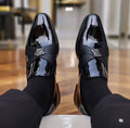 Glossy black patent leather men's dress loafer