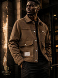 Corduroy utility jacket with front button pockets and a collar.