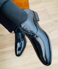 Glossy black patent leather oxford dress shoes