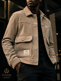 Corduroy utility jacket with front button pockets and a collar.