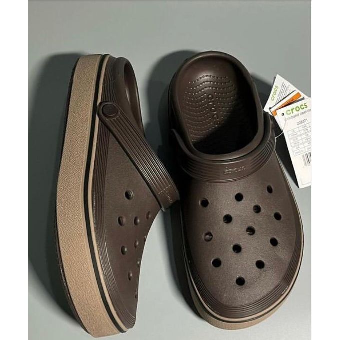 Brown platform-style rubber clogs