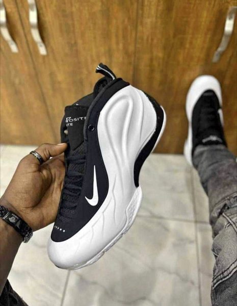 Black-and-white Nike Foamposite Lite sneakers