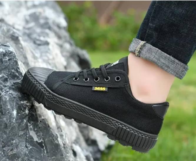 Black, low-top canvas work sneaker
