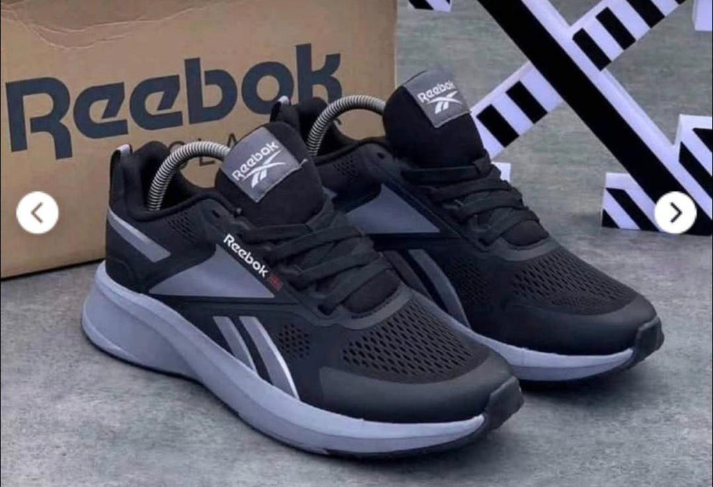 Black and grey Reebok mesh trainer running sneakers