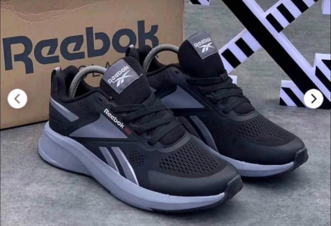 Black and grey Reebok mesh trainer running sneakers
