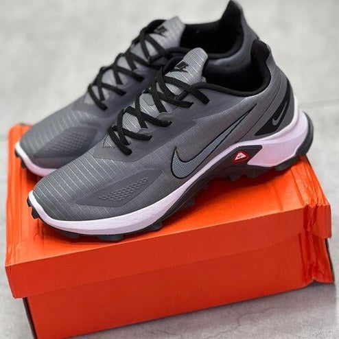 Gray and black Nike running sneakers