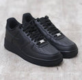 All-black Nike Air Force 1 low-top sneaker