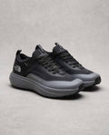 Black and grey The North Face sneakers