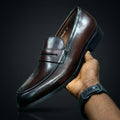Brown burnished leather penny loafers