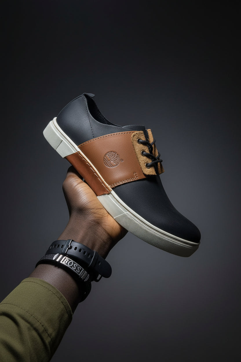 Dark brown and tan casual low-top lace-up leather shoe
