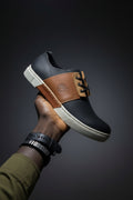 Dark brown and tan casual low-top lace-up leather shoe