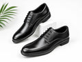 Sleek black men's formal lace-up derby shoes