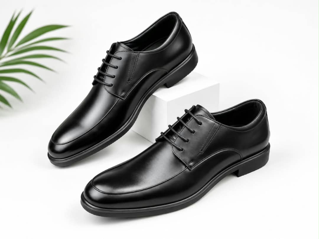Sleek black men's formal lace-up derby shoes